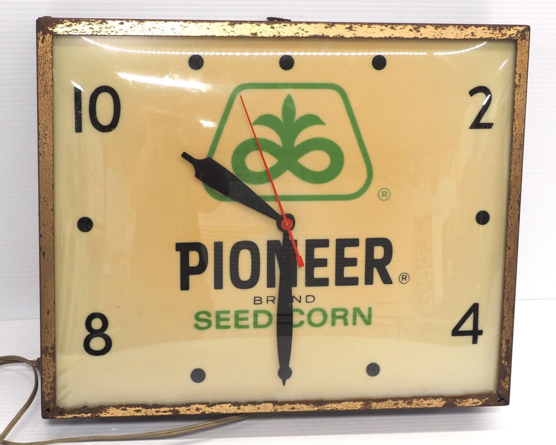 Lighted Pioneer clock: 16"x13" tin & glass lighted Pioneer clock ***This lot will be delivered to the local UPS store for professional packaging.