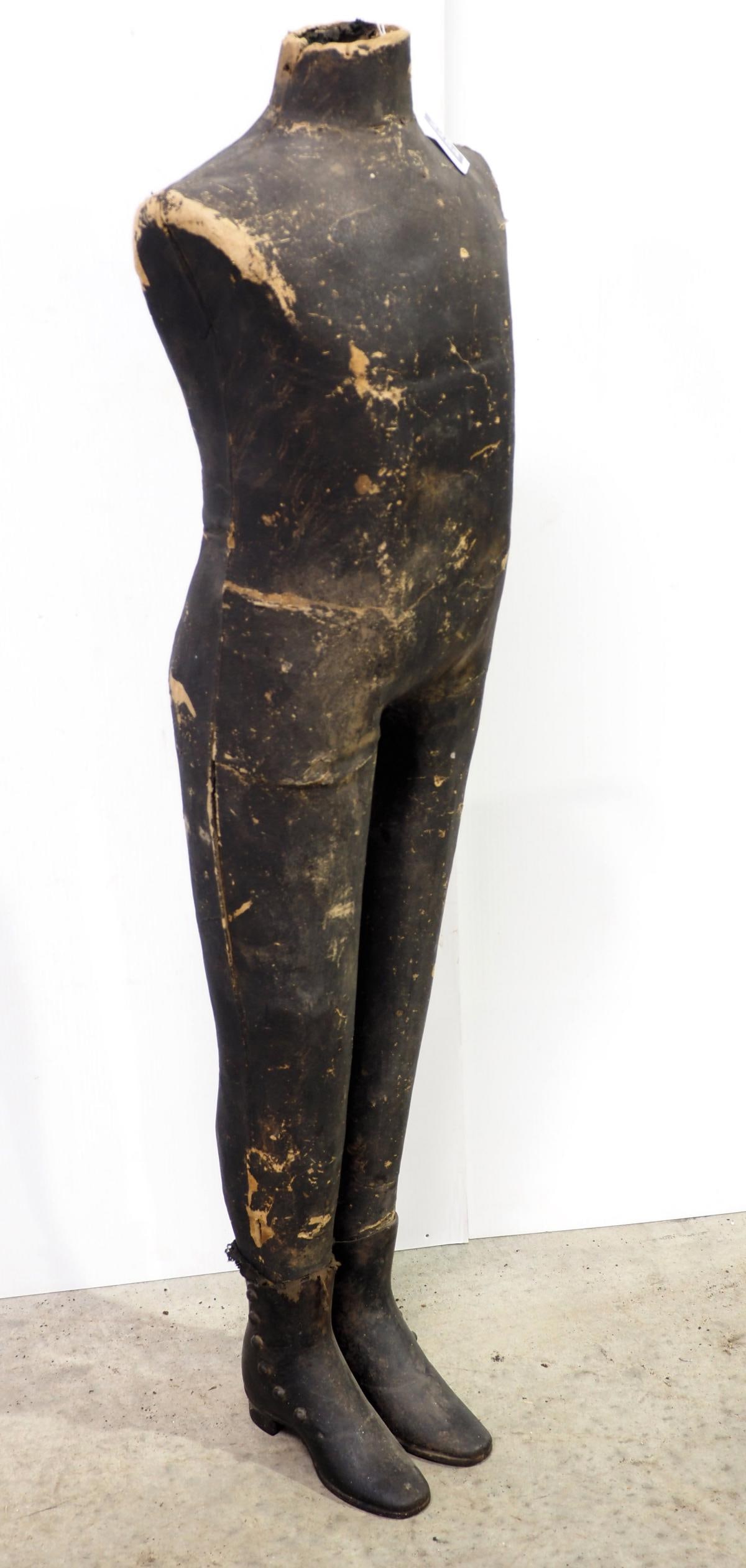 Country store mannequin with cast iron shoes: 44"H country store mannequin with cast iron shoes -Fair