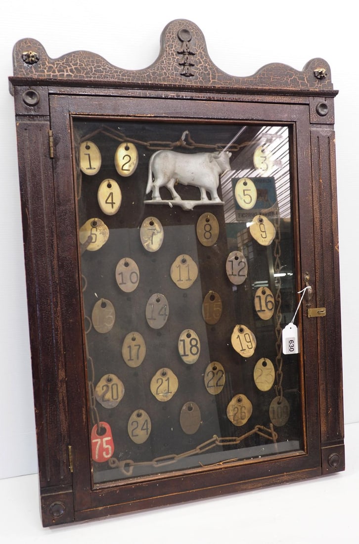 Display cabinet of cow tags (1 of 4)