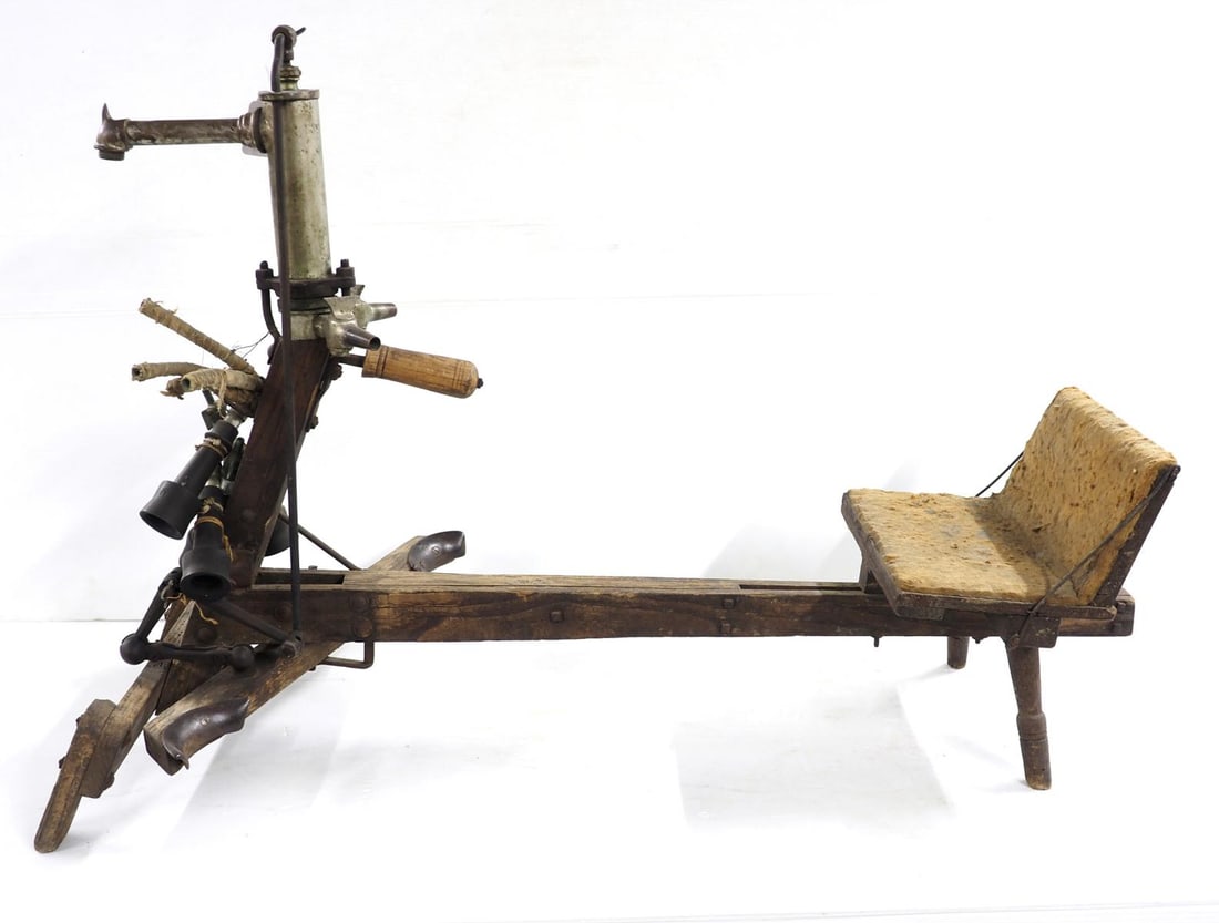 Very early pedal-powered cow milking machine (1 of 2)