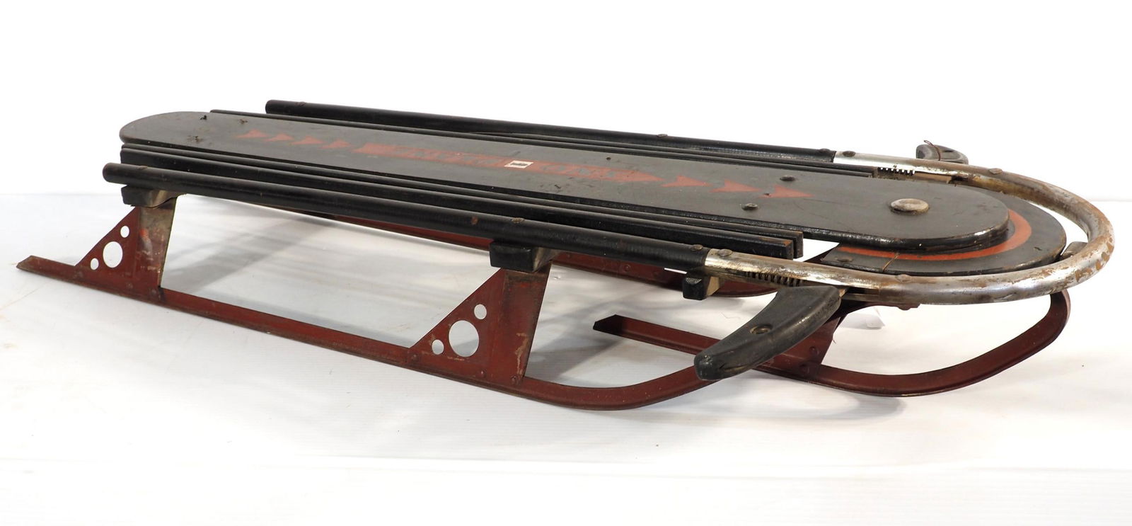 Sno-Plane child's sled spring-loaded mechanism (1 of 3)