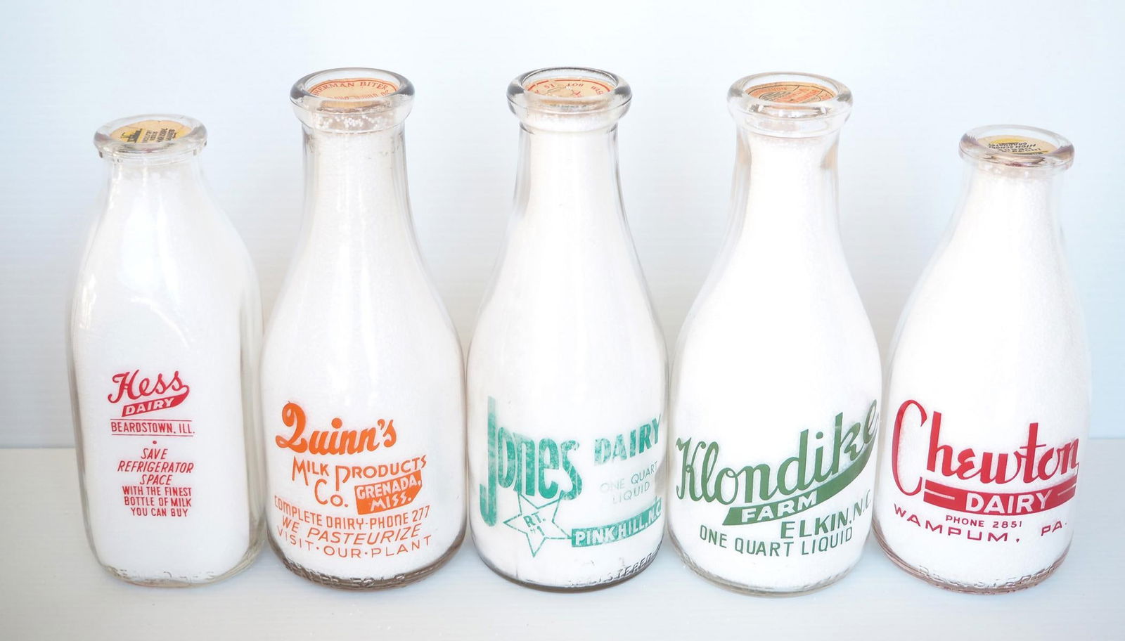 (5) 1 quart milk bottles (1 of 2)