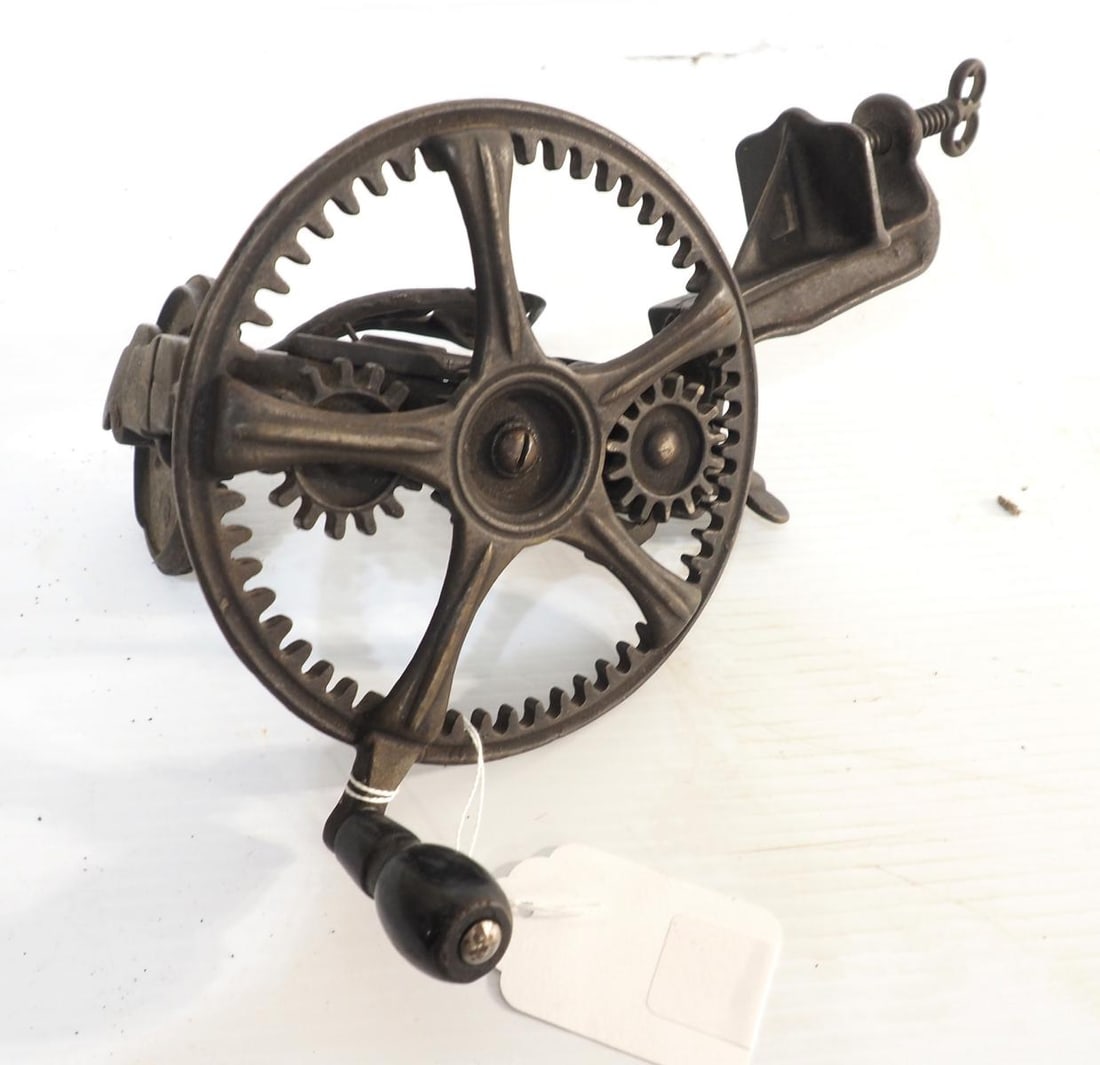 Hand-crank, table-mount apple peeler (1 of 2)