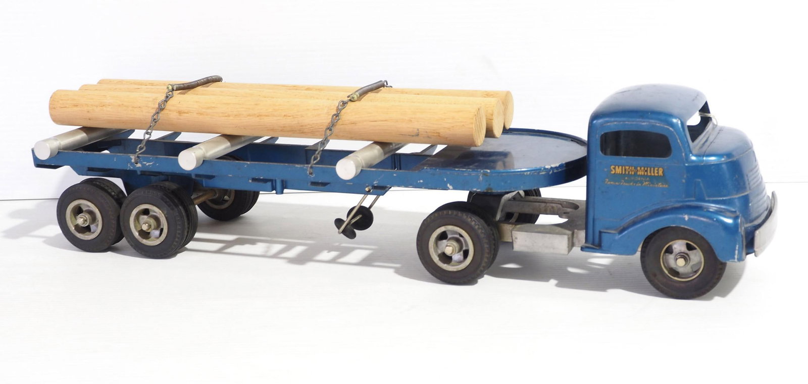 Smith Miller Log Truck: 23" long cast Smith Miller Log Truck, replaced logs