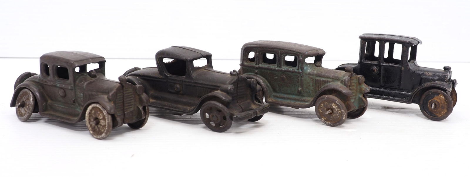 (4) Early cast iron cars (1 of 3)