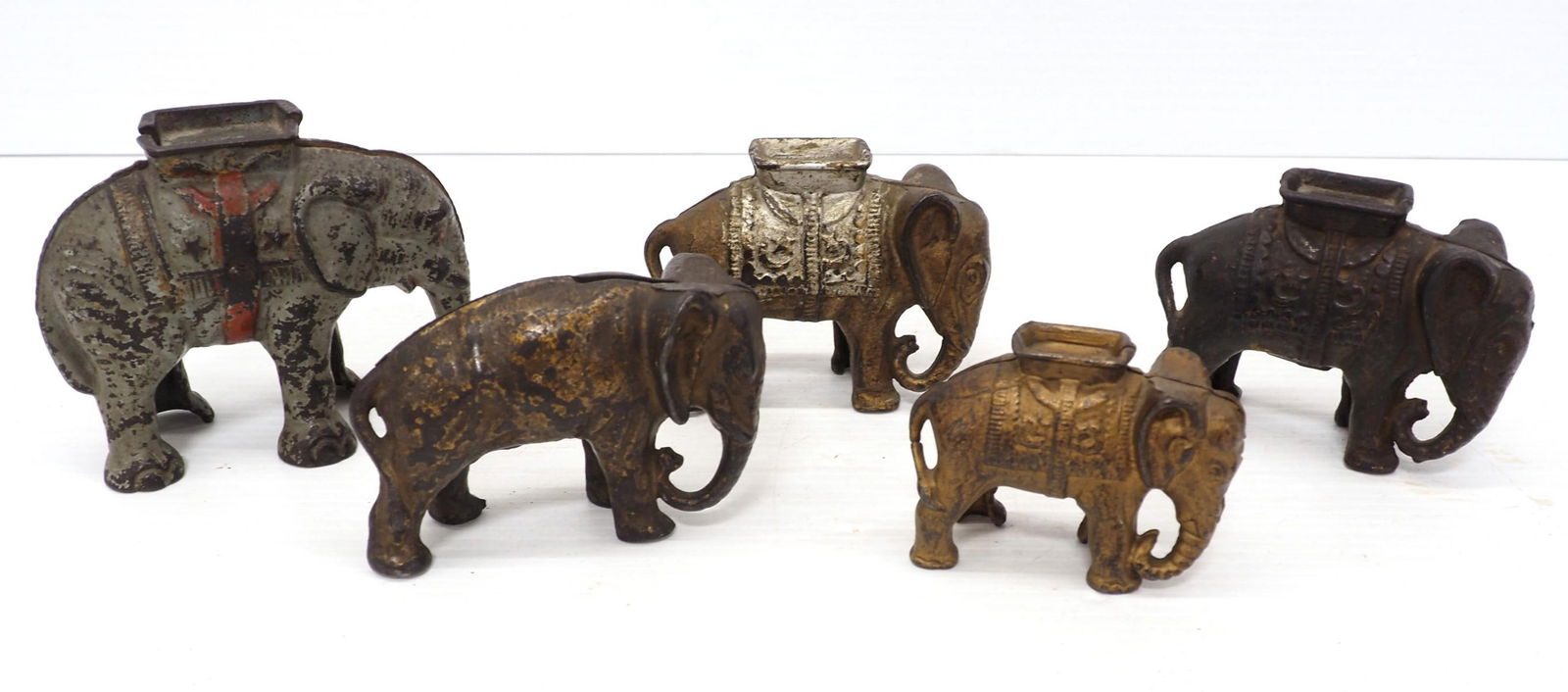 (5) Cast iron elephant banks (1 of 4)
