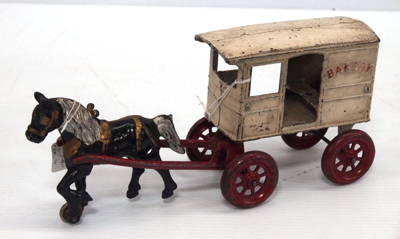 Keystone Bakery wagon hitched to a single horse (1 of 2)