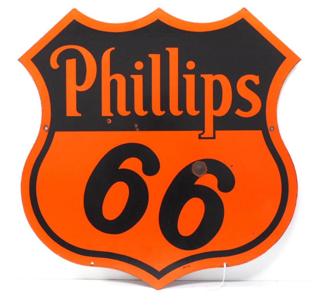 Phillips 66 sign with bullet dent (1 of 6)