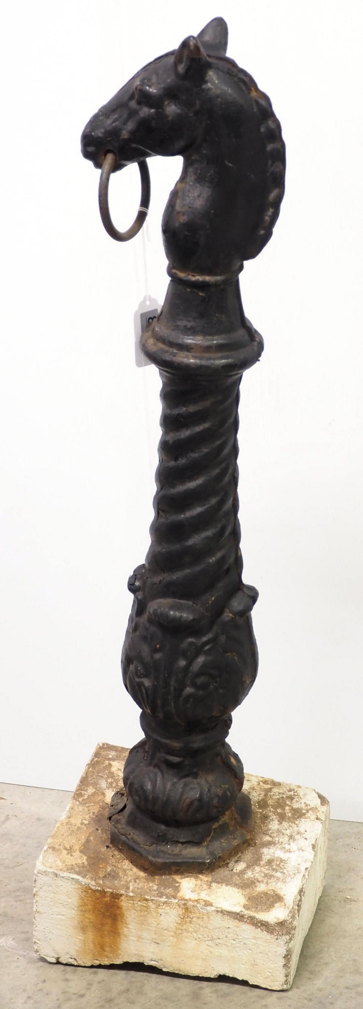 Cast iron horse head horse tie: Cast iron horse head horse tie with ring and floral design, concrete base, 35"H plus base - some filler at the seams * * BUYER TO ARRANGE PICK-UP