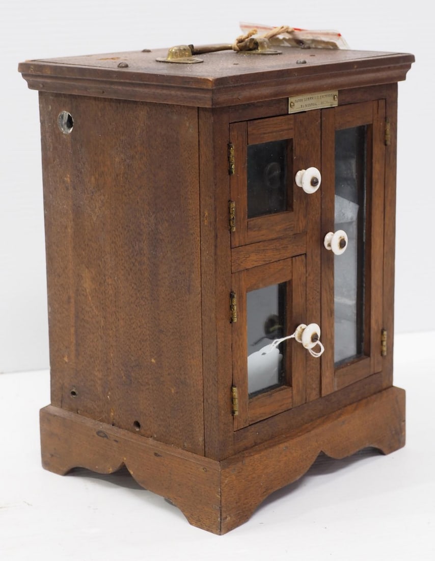 Patent model refrigerator: Patent model refrigerator by Jacob Lorenz & H.F.W. Bender, Hamilton, Ohio, with original patent tag but unreadable date