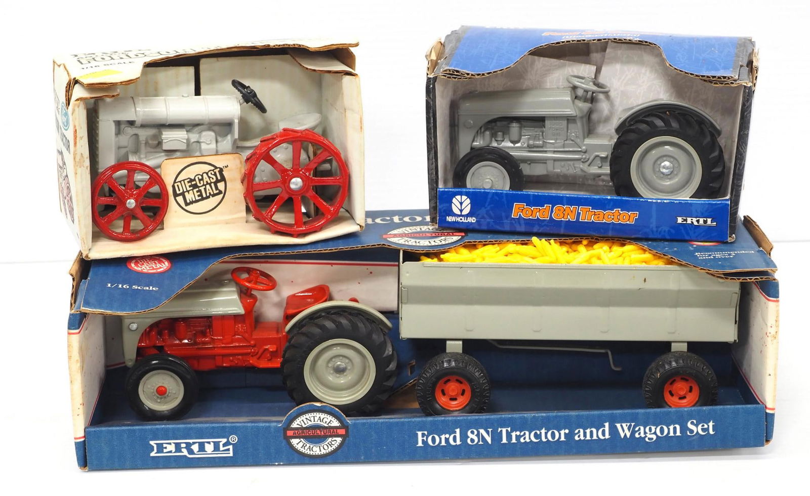 (3) Ford tractors, NIB (1 of 2)