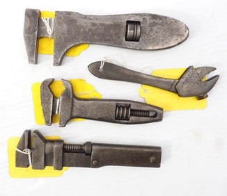 (4) Small screw-adjust wrenches