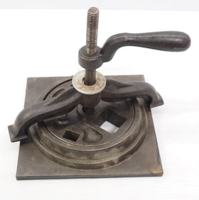 Revolving bench-mount tinner's plate