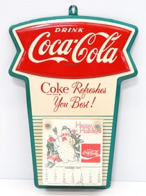 Coca Cola fishtail calendar sign