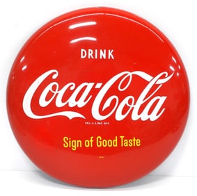 Coca Cola button sign