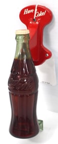 Coke bottle door pull