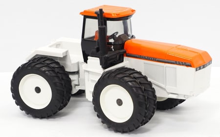 John Deere 8760 4WD, custom painted in orange