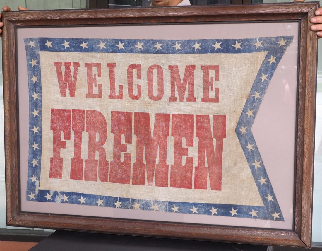 Welcome Fireman Banner: Framed cloth Welcome Fireman Banner , 43" x 31" -Minor areas of thinning & some discoloration *NOTE: This item will be packaged and shipped when we return to our Indiana facility the week of June 16.