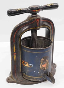 2-quart cast iron & metal fruit press