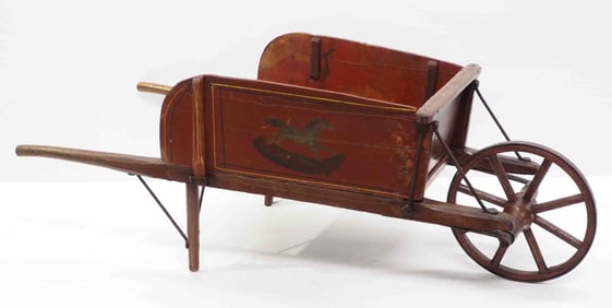 Early wooden child's wheelbarrow