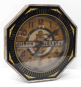 Golden Guernsey spinner clock