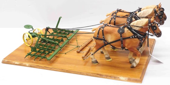 Custom horse-drawn John Deere spike tooth drag