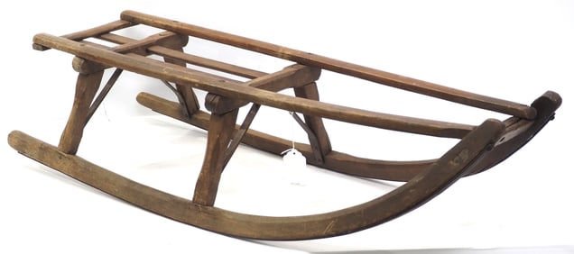 Primitive wood and iron child sled