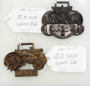 (2) J.I. Case watch fobs