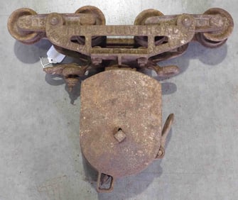 Universal steel track hay trolley