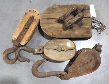 Assorted large pulleys