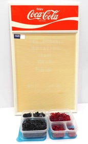 Coca Cola menu board with letters