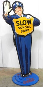 Coca Cola "Slow, School Zone" policeman sign