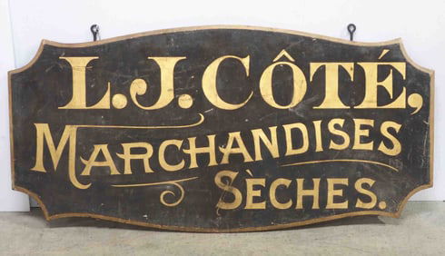 L.J. Cote Marchandises Seches sign