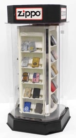 Plastic, rotating Zippo lighter display case