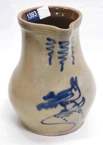 Crock jug with bird decoration