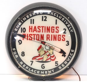 Hastings Piston Rings lighted clock