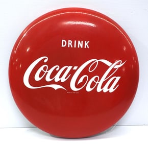 Coca Cola button sign