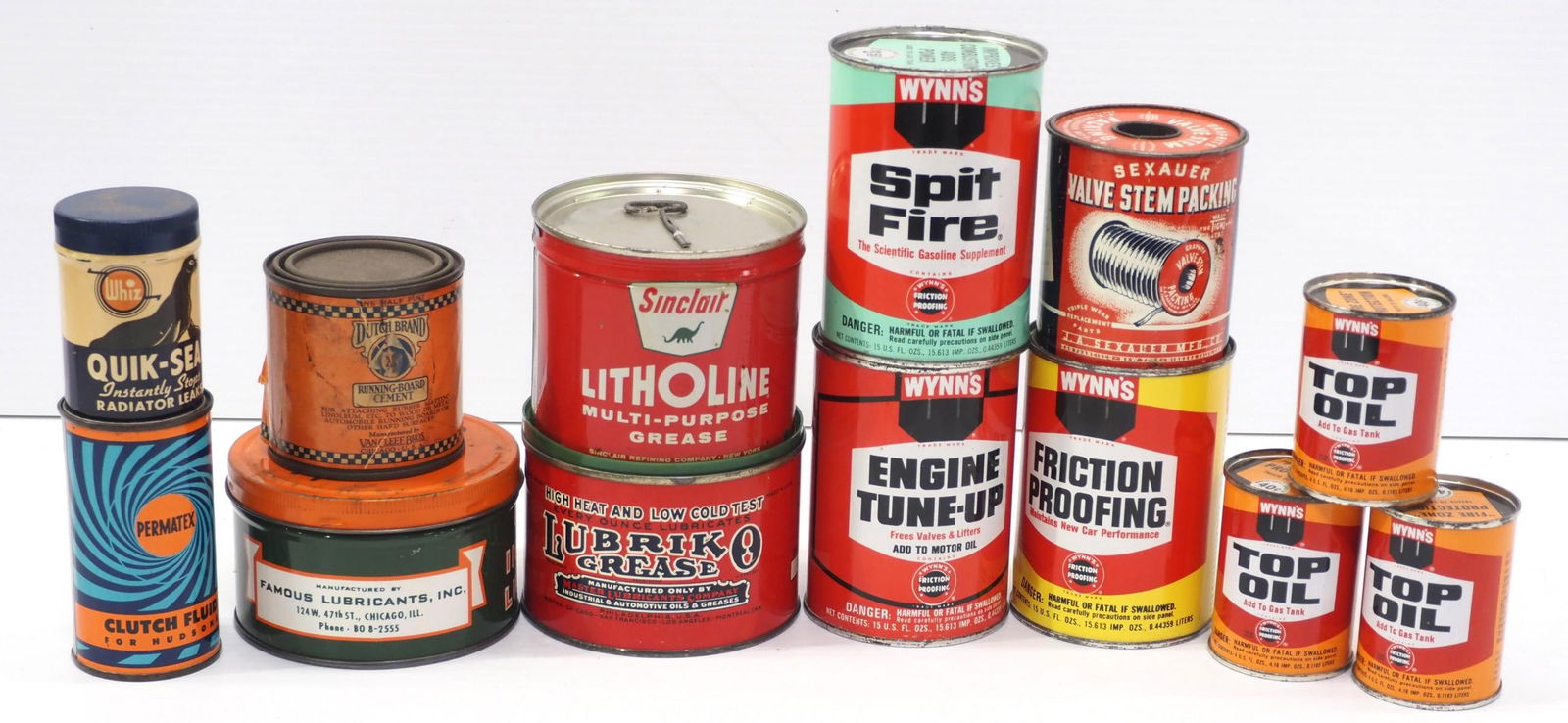 Assorted cans of petroleum products (1 of 2)