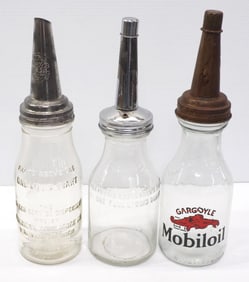 (3) 1-quart glass oil bottles with metal spouts