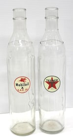 (2) 1-quart tall glass oil bottles with labels