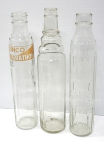 (3) 1-quart tall glass oil bottles