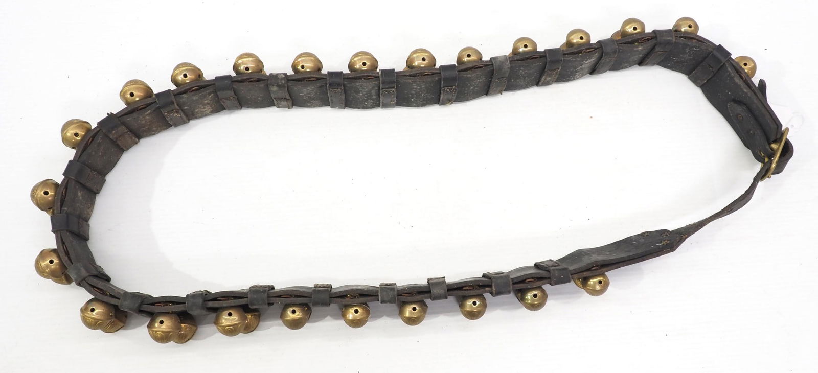 Leather strap of 48 brass harness bells, strap is 64"L and stamped Don Livingston (1 of 2)