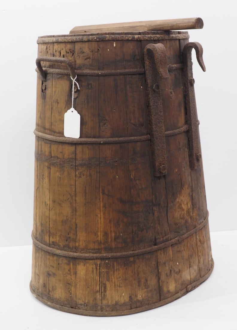 Very early wood & hand-forged water or grain barrel that hooks to side of wagon: 28" x 22" x 17" Very early wood & hand-forged water or grain barrel that hooks to side of wagon * * White Glove delivery services available, contact auction house for details.