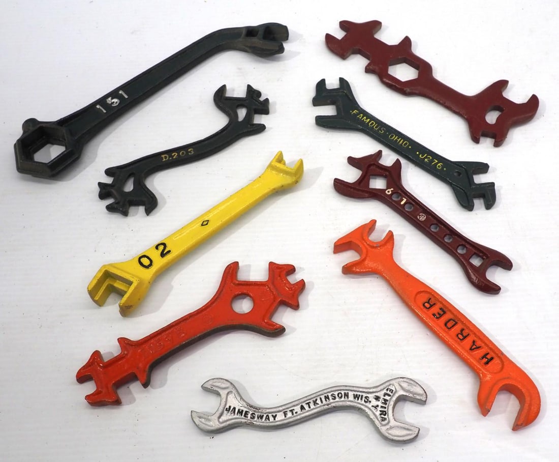 (9) Cast iron wrenches including Harder, Jamesway, Famous, IHC and more: (9) Cast iron wrenches including Harder, Jamesway, Famous, IHC and more
