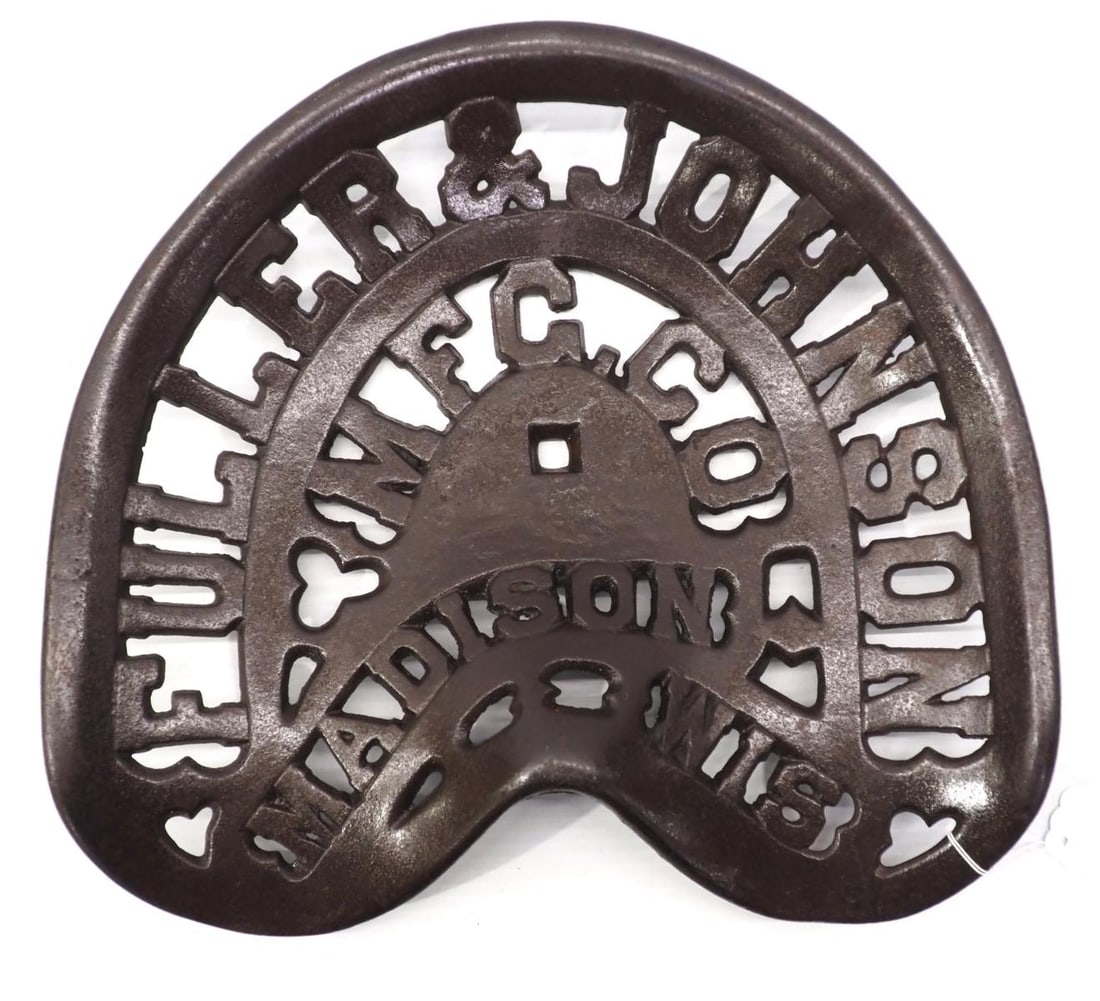 Fuller & Johnson, Madison, Wis. Cast iron seat: Fuller & Johnson, Madison, Wis. Cast iron seat - cracked