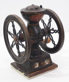 Landers, Frary & Clark No.20 Crown cast iron coffee grinder with original label and some graphics,