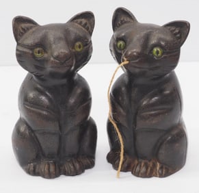 Matching cast iron cat-shaped door stop and string holders