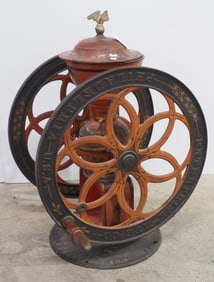 Enterprise No.12 cast iron coffee grinder with excellent color and markings, wheel dia. is 24", 34"H