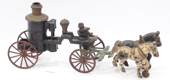 Cast iron horse-drawn fire pumper, 16.5"L overall