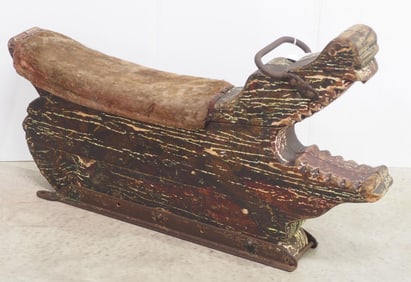 Early wooden carousel alligator with handle and fabric seat, 42"L